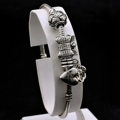 PANDORA BRACCIALE MOMENTS IN ARGENTO 925 + 4 CHARMS - Immagine 1 di 4