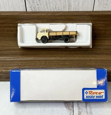 Camión plataforma Roco #1562 beige/negro/marrón HO usado. Nuevo en caja. Foto 1 de 4