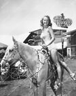8b20-21213 Janet Leigh in swimwear getting on a horse at Desert Inn hotel 8b20-2