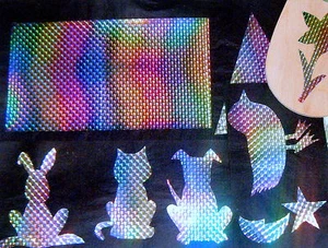 ferro prismatico glitter on.transfer forme tagliate per TESSUTO,ecc.ingrosso.5 metri - Foto 1 di 2
