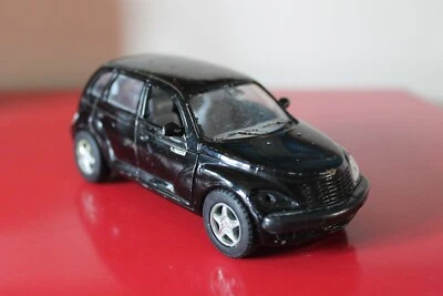 Faro de juguete negro Kinsmart 5"" Chrysler Cruiser 1:34 usado falta uno Foto 1 de 4