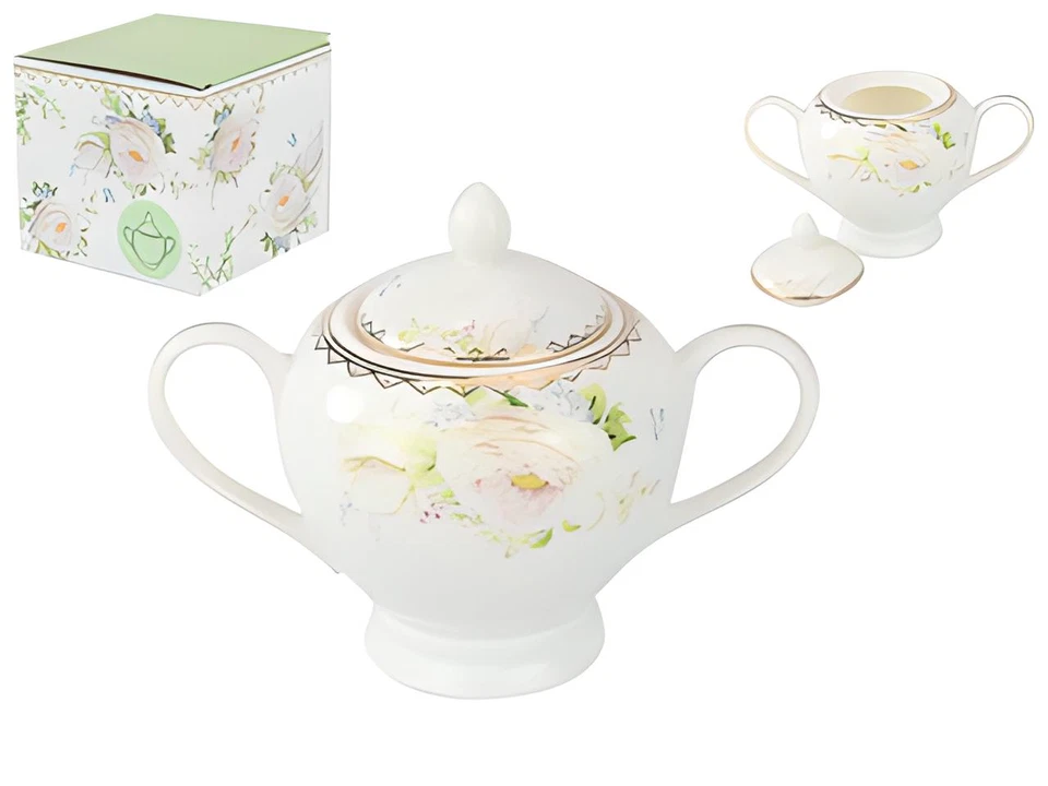 Hermosa taza y platillo floral de porcelana de hueso, jarra de leche y azucarera Foto 1 de 4