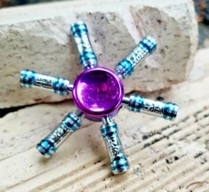 Genial juguete giratorio calmante de metal azul plateado niños niñas niños adultos enfoque TDAH 👀 - Imagen 1 de 12