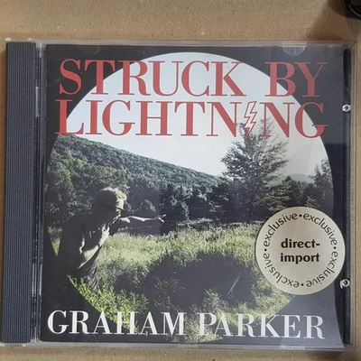 GRAHAM PARKER Struck By Lightning  EX/EX(CD) - Bild 1 von 4