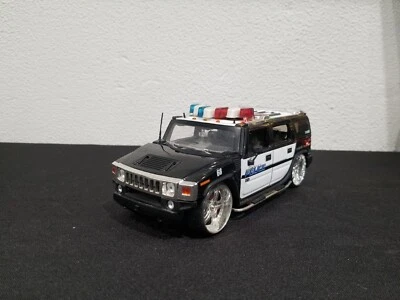 JADA TOYS DUB CITY 2003 HUMMER H2 POLICE 1:24 DIECAST BLACK WITH GRAPHIC 68 ASIS - Image 1 of 4