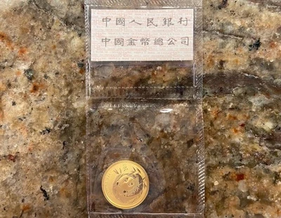 Moneda panda de oro de China de 20 yuanes 2003 1/20 oz Foto 1 de 2