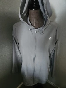 Chaqueta cortavientos con capucha Adidas Golf para hombre/unisex/mujer gris cremallera completa talla L - Imagen 1 de 4