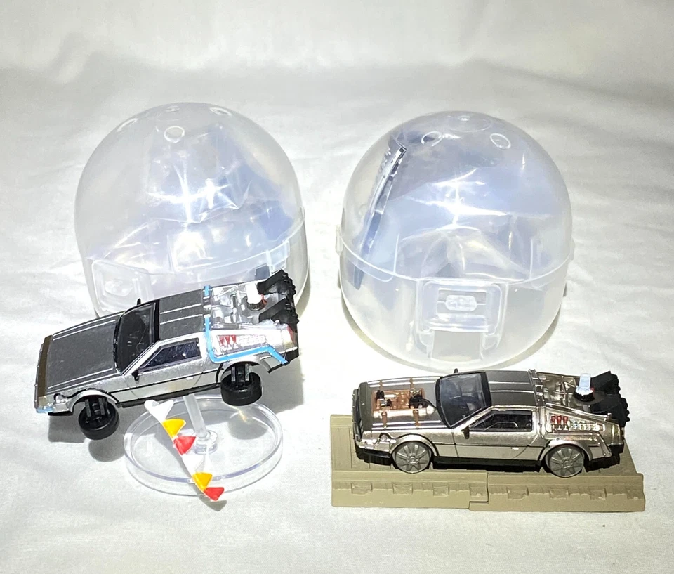 Back to the Future Delorean Time Machine 2da edición lote de 2 gashapon TakaraTomy nuevo Foto 1 de 3