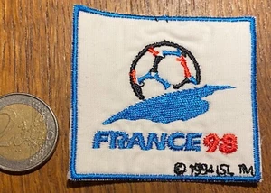 ECUSSON DE BRAS COUPE DU MONDE FOOTBALL FRANCE 98 (ECU 36) - Picture 1 of 3