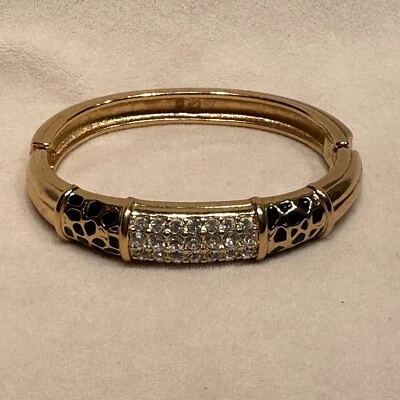 DE COLECCIÓN: PULSERA con bisagras de cristal con detalles dorados y negros de SWAROVSKI Foto 1 de 4