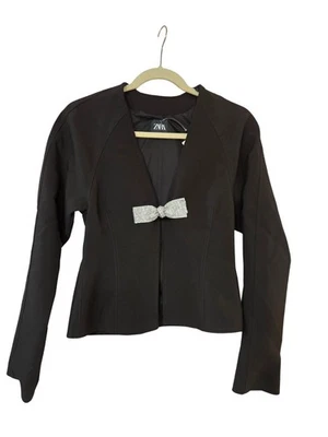 Top ajustado con lazo de diamantes de imitación negro talla XS NUEVO CON ETIQUETAS Foto 1 de 4