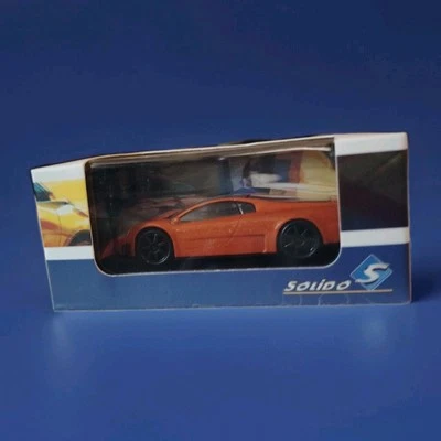 SOLIDO -VOLKSWAGEN NARDO W 12 COUPE -Modellino Auto Metallo Arancione 1:64 - Immagine 1 di 4