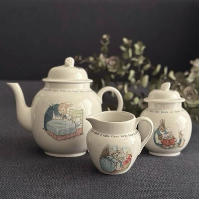 Wedgwood Peter Rabbit Teapot, Sugar Pot and Creamer Set 23886 - Image 1 of 4