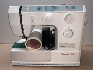 Bernette 740E Sewing Machine with book, power set and some feet in drawer. - Picture 1 of 17