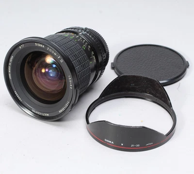 SIGMA ZOOM ll 21-35mm f/3.5-4.2 W HOOD & CAPS NIKON AI-S MOUNT VERY LIGHT HAZE - Image 1 of 4