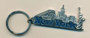 LLAVERO - LLAVERO - NUEVA YORK #4 - LETRAS AZULES - HORIZONTE - ESTATUA DE LA LIBERTAD - PUENTE - Imagen 1 de 2