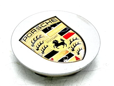 BMW BOXSTER CAYMAN CAYENNE 2003-2024 BUJE CENTRAL DE RUEDA EMBLEMA TAPA PLATEADA Foto 1 de 4