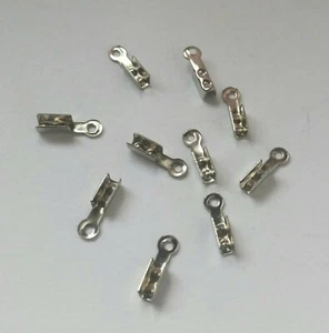 LOT 100 EMBOUTS à écraser plier 7x2mm ARGENTES foncé pour cordon 1mm SANS NICKEL - Imagen 1 de 1