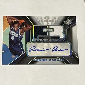 F79323 2006-07 SPx #148 Ronnie Brewer JSY AUTO/1199 JAZ RC - Picture 1 of 2