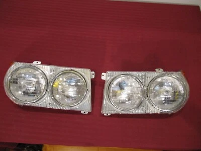 Montajes de faros izquierdo y derecho Bosch Mercedes-Benz W107 280SL 350SL 450SL Foto 1 de 4