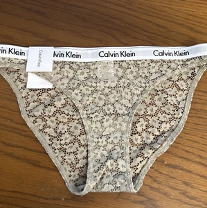 NUEVO CON ETIQUETAS Calvin Klein Talla (X-Pequeña) Carrusel Encaje Bikini Brief QD3860-240 - Imagen 1 de 8