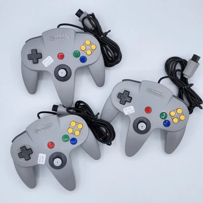 Lot of 3 Genuine OEM Nintendo 64 N64 Controllers AS-IS Loose Joysticks - Image 1 of 4