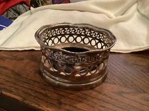 SILVER PLATED AND WOOD PIERCED WINE BOTTLE CADDY - Picture 1 of 5