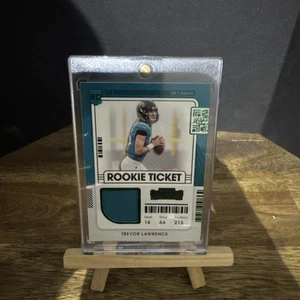2021 Panini Contenders- Rookie Ticket Swatches #RTS-TRL Trevor Lawrence (MEM/RC) - Picture 1 of 2