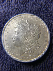 1887 Morgan Silver Dollar - Picture 1 of 2