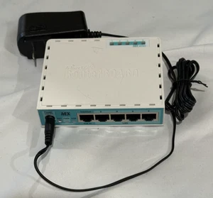MikroTik RB750Gr3 5port Ethernet Gigabit Router RouterBOARD Power Supply Powers - Afbeelding 1 van 3