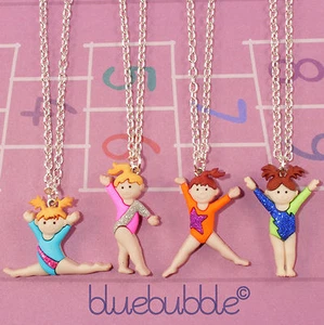 FUNKY DANCING DOLL NECKLACE CUTE NOVELTY KITSCH SWEET SPORTS FUN GIRLS XMAS GIFT - Picture 1 of 5