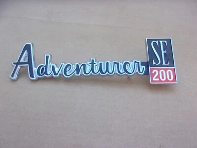 NOS Mopar 1977-1980 Dodge Truck Adventurer SE 200 Fender Nameplate - Image 1 of 2