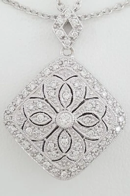 Collar colgante medallón flor diamante redondo oro blanco de 18 quilates 0,53 quilates venta al por menor $4K Foto 1 de 4