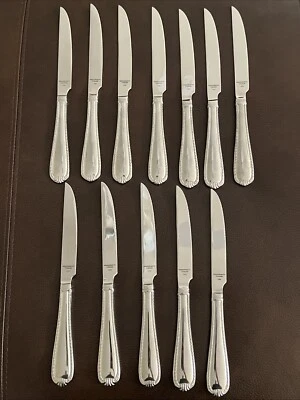 12 - CUCHILLOS PARA CARNE cubiertos de acero inoxidable con borde de cuerda brillante Reed & Barton DOMINIO Foto 1 de 2