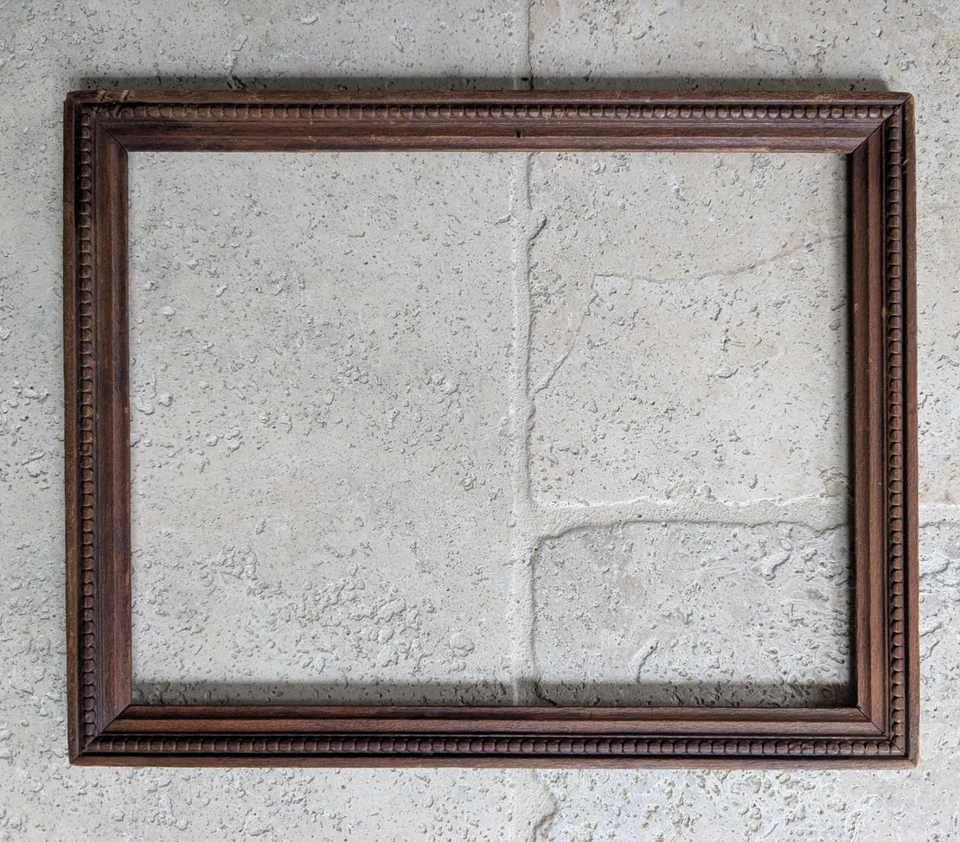 Cadre en bois sculpté - Photo 1/4