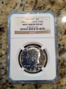 1966 SMS 50c Obverse Struck Thru Mint Error NGC MS66 - Picture 1 of 2