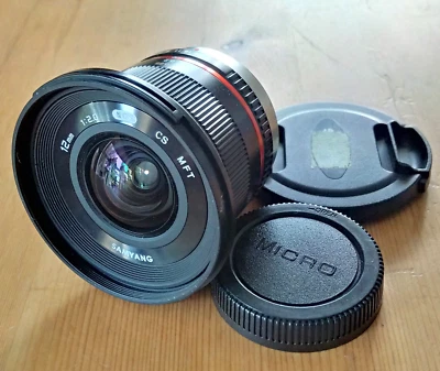Samyang 12mm f/2 NCS CS Ultra Wide Manual Focus Camera Lens for MFT Mount + Caps - Image 1 of 4