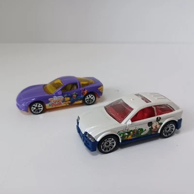 LOT of 2 Mattel Matchbox Tigger Pooh Mickey Mouse Corvette & Police Car - Image 1 of 4