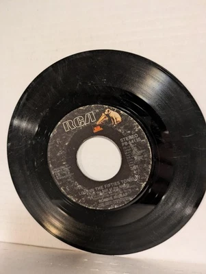 45 ~Ronnie Milsap: "Lost in the Fifties Tonight / I Might Have Said" 1985 (G+) - Image 1 of 4