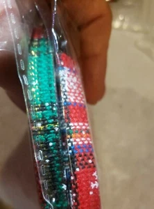 2 Rolls Christmas Plaid Ribbon 3/8" wide. Each roll 5 1/4" Diameter - Picture 1 of 2