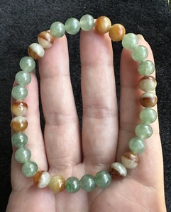 BRACCIALE GIADA NATURALE PERLINE PIETRE MISURA 7MM COLORE VERDE GHIACCIO NATURALE E GIALLO - Foto 1 di 9