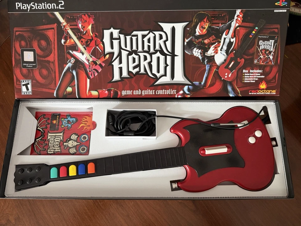 Caja abierta Playstation 2 PS2 Guitar Hero rojo y negro octano SG Gibson guitarra solamente Foto 1 de 1