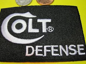 COLT DEFENSE FIREARMS LOGO IRON ON BACKING VEST PATCH 3 X 2 INCH GUN EMBLEM LOOK - Picture 1 of 16