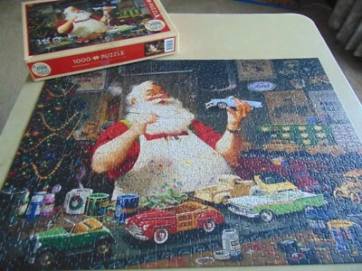 Cobble Hill "Santa Painting Cars" Jigsaw Puzzle 1000 Piece Complete - Image 1 of 4