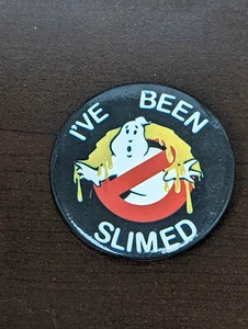 VINTAGE 2 1/4" 1984 GHOSTBUSTERS MOVIE PROMO BUTTON I'VE BEEN SLIMED BUTTON - Picture 1 of 2