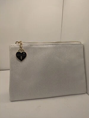 Bolsa de cosméticos saks five avenue brillo Foto 1 de 4