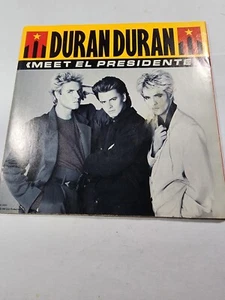 DURAN DURAN MEET EL PRESIDENTE / VERTIGO 45 7" + POSTER SLEEVE VG+ F168 - Foto 1 di 2