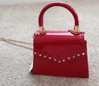 Mini bolso de mano de latón rojo Foto 1 de 4