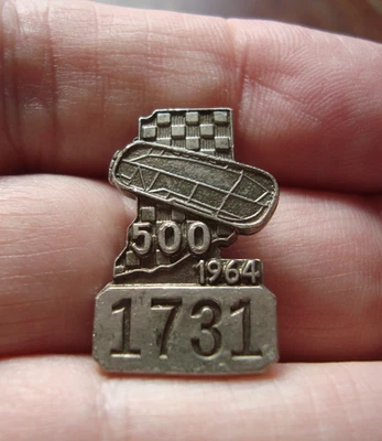 1964 INDIANAPOLIS MOTOR SPEEDWAY INDY 500 SILVER TONE PIT BADGE #1731,  AJ FOYT - Image 1 of 4