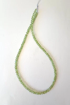 CUENTAS RONDELLE PERIDOTO FACETADO 4 MM - 14,25" Hilo - 3851E Foto 1 de 3